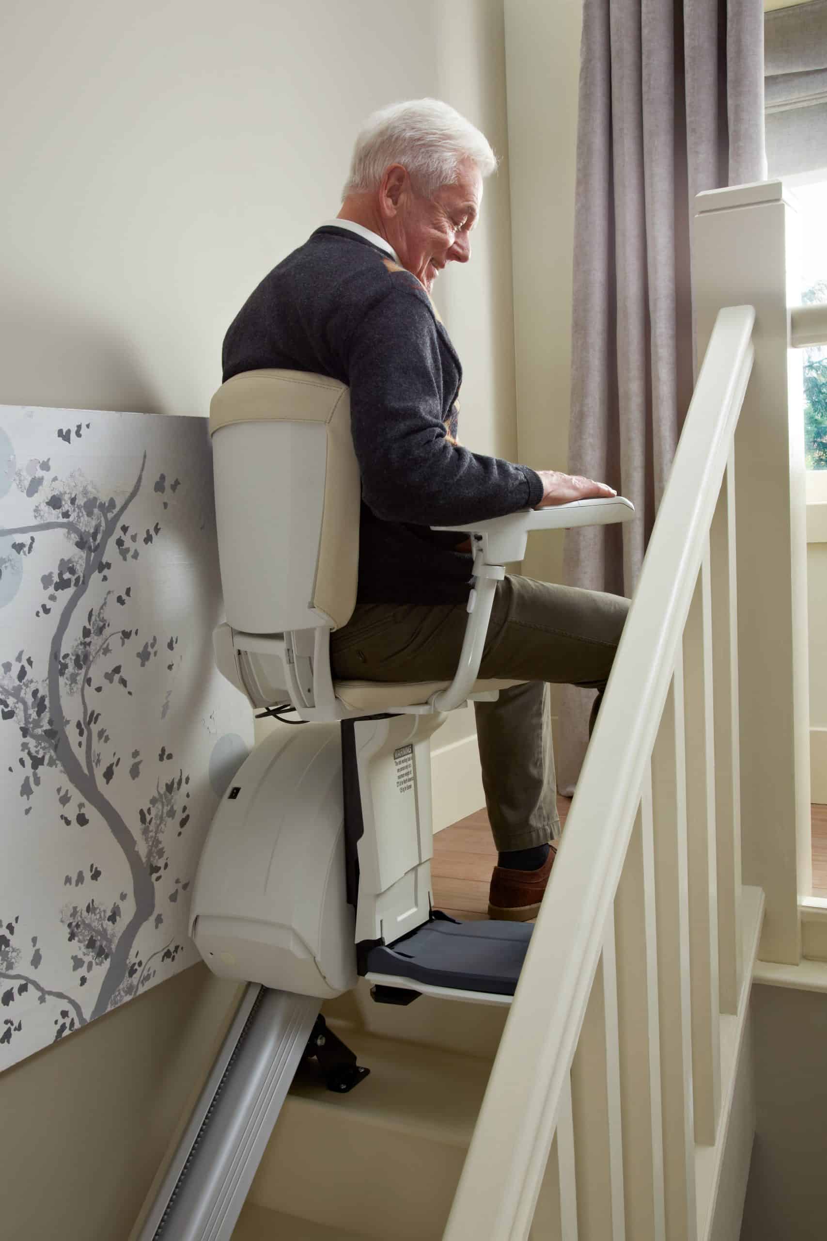 lady getting out of a stairlift